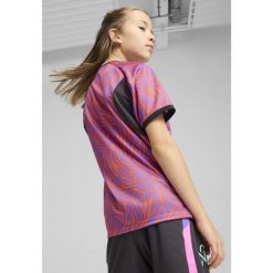 Młodzieżowa koszulka piłkarska Neymar Jr Creativity PUMA. Fioletowa bluzki Puma, m, bez wzorów, młodzieżowe, bez kołnierzyka, bez ramiączek. W wyprzedaży za 114.00 zł.