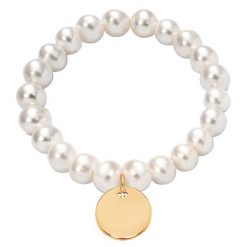 Bransoletka z pozłacanym medalikiem na dużych białych perłach. Białe bransoletki Lilou, z perłą, pozłacane. Za 432.50 zł.