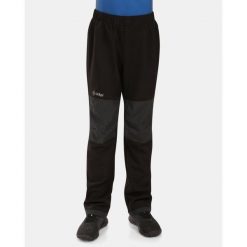 Pantaloni outdoor softshell per bambini Kilpi RIZO-J. Czarne spodnie sportowe Kilpi, na lato, bez wzorów, z softshellu, outdoorowe. Za 179.35 zł.