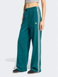 Adidas Spodnie dresowe FIREBIRD Zielony Loose Fit. Zielone spodnie dresowe Adidas, xl, bez wzorów, z dresówki. Za 298.99 zł.