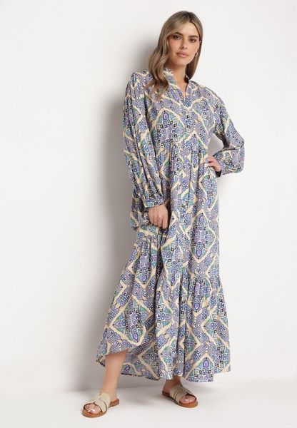 Niebieska Rozkloszowana Sukienka z Wiskozy Zapinana na Guziki z Falbanką Nrines. Niebieskie sukienki Born2be, na co dzień, l, bez wzorów, z wiskozy, eleganckie, bez kołnierzyka, bez ramiączek, maxi, rozkloszowane. Za 69.99 zł.