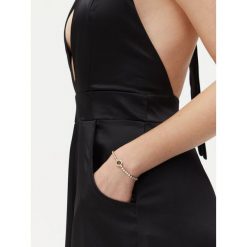Bransoletka Guess. Żółte bransoletki Guess, złote. Za 189.99 zł.