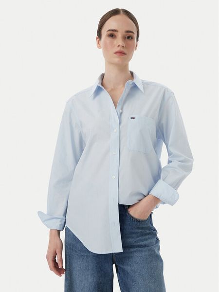 Tommy Jeans Koszula Essential DW0DW23456 Niebieski jasny Relaxed Fit. Niebieskie koszule Tommy Jeans, m, bez wzorów, z bawełny, bez kołnierzyka, bez ramiączek. Za 409.99 zł.