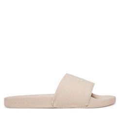 Klapki Calvin Klein Jeans. Brązowe klapki Calvin Klein Jeans, bez wzorów, z jeansu, bez obcasa. Za 109.99 zł.