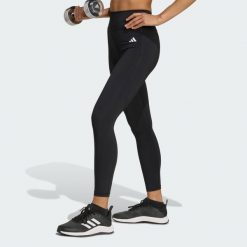 Legginsy 7/8 bez szwu z przodu Optime Essentials. Czarne legginsy Adidas, s, bez wzorów. Za 219.00 zł.