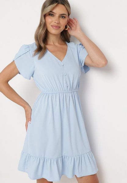 Jasnoniebieska Rozkloszowana Sukienka z Gumką w Talii i Falbanką Welimia. Niebieskie sukienki Born2be, na lato, l, bez wzorów, bez kołnierzyka, bez ramiączek, rozkloszowane. Za 59.99 zł.