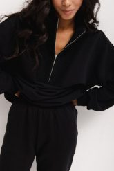 Bluza damska z zamkiem na dekolcie w kolorze TOTALLY BLACK- CLERMONT. Czarne bluzy Marsala, bez wzorów, z bawełny, bez ramiączek. Za 319.90 zł.