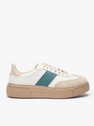 Sneakersy z zielonym akcentem. Brązowe obuwie sportowe Ryłko, ze skóry, bez zapięcia. Za 429.99 zł.