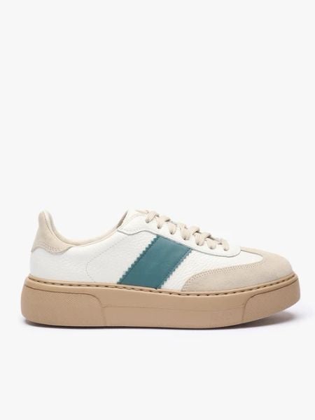 Sneakersy z zielonym akcentem. Brązowe obuwie sportowe Ryłko, ze skóry, bez zapięcia. Za 429.99 zł.