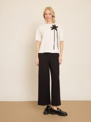 BGN Koszulka w kolorze kremowym rozmiar: 36. Brązowe bluzki BGN, z aplikacjami, bez kołnierzyka, bez ramiączek. Za 56.99 zł.