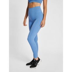 Legginsy damskie Hummel Tif. Niebieskie legginsy sportowe Hummel, bez wzorów, z dzianiny, na jogę i pilates. Za 128.00 zł.