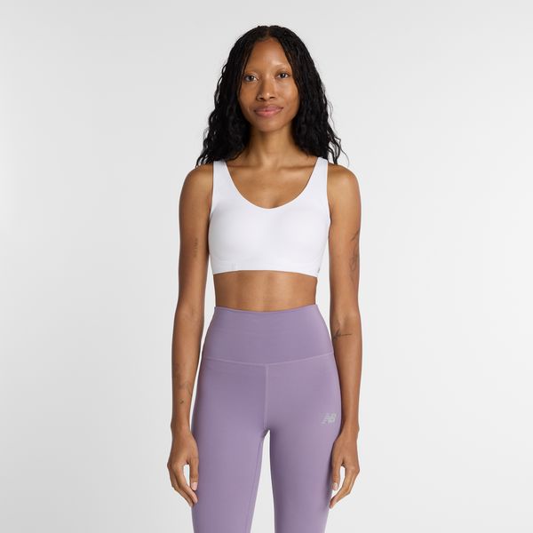 Biustonosz do biegania New Balance WB51052WT – biały. Białe biustonosze New Balance, bez wzorów, z lycry. Za 249.99 zł.