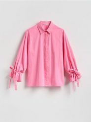 Koszula z wiązaniami przy rękawach - intensywny róż. Czerwone koszule Reserved, l, bez wzorów, z bawełny, bez kołnierzyka, bez ramiączek. Za 159.99 zł.