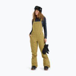 Spodnie snowboardowe damskie ROXY Rideout Bib. Brązowe spodnie narciarskie Roxy, m, bez wzorów, z materiału, narciarskie, primaloft. Za 1,166.95 zł.