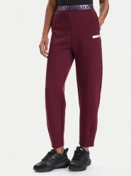 EA7 Emporio Armani Spodnie dresowe 7W000678 AF13151 M5064 Bordowy Regular Fit. Czerwone spodnie sportowe EA7 Emporio Armani, m, bez wzorów, z dresówki. Za 439.99 zł.