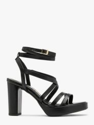 Czarne sandały z ozdobnych paseczków. Czarne sandały Ryłko, bez wzorów, z gumy, bez obcasa, na słupku, bez zapięcia. W wyprzedaży za 259.99 zł.