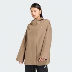 PARKA PRZECIWDESZCZOWA ESSENTIALS. Czarne parki Adidas, l, z materiału, biznesowe, bez kaptura. Za 439.00 zł.
