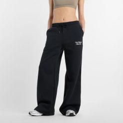 Spodnie damskie New Balance WP51954BK – czarne. Czarne spodnie materiałowe New Balance, na co dzień, l, bez wzorów, z bawełny. Za 169.99 zł.