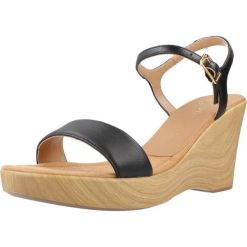 Sandały UNISA RITA NTO Czarny. Czarne sandały Unisa, bez wzorów, ze skóry, sportowe, bez obcasa, bez zapięcia. Za 351.99 zł.