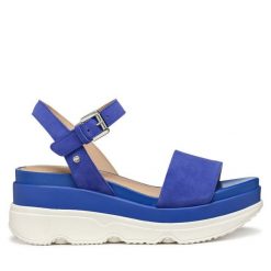 Sandały Geox. Niebieskie sandały Geox, bez wzorów, bez obcasa, na koturnie, bez zapięcia. Za 519.99 zł.
