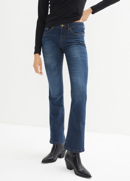Dżinsy ze stretchem o kroju bootcut, mid waist. Niebieskie jeansy bonprix, bez wzorów. Za 79.99 zł.