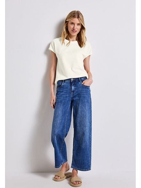 Street One Koszulka w kolorze kremowym rozmiar: 34. Brązowe bluzki Street One, bez wzorów, street, bez kołnierzyka, bez ramiączek. Za 104.99 zł.