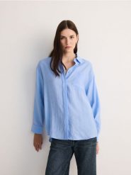 Koszula oversize z modalu - niebieski. Niebieskie koszule Reserved, l, bez wzorów, z tkaniny, bez kołnierzyka, bez ramiączek. W wyprzedaży za 79.99 zł.