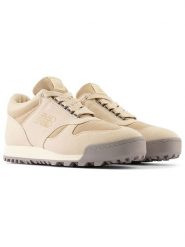 New Balance Skórzane sneakersy "Rainer" w kolorze beżowym rozmiar: 44,5. Brązowe trampki New Balance, bez wzorów, z materiału, bez zapięcia. Za 356.61 zł.