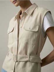 Koszula bez rękawów z wiskozą i domieszką lnu - beżowy. Brązowe koszule Sinsay, l, bez wzorów, z wiskozy, bez kołnierzyka, bez ramiączek. Za 49.99 zł.