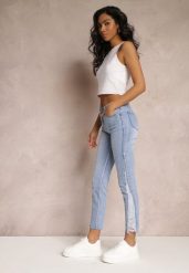 Niebieskie Jeansy Skinny z Regularnym Stanem i Przetarciami Darionna. Niebieskie jeansy Renee, uniwersalny, bez wzorów. Za 44.99 zł.