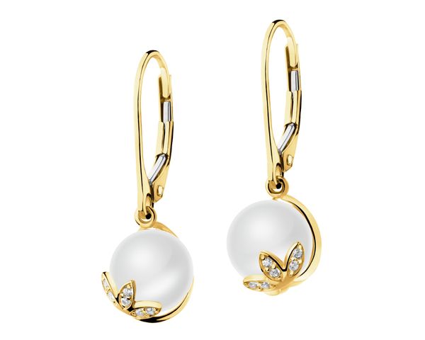 Złote kolczyki z perłami i cyrkoniami - kwiaty lotosu. Żółte kolczyki Apart, z cyrkonią, złote. Za 1,139.00 zł.