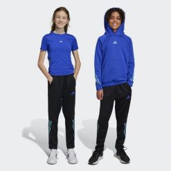 Train Icons AEROREADY 3-Stripes Knit Pants. Czarne spodnie dresowe Adidas, bez wzorów, z dresówki. W wyprzedaży za 178.30 zł.