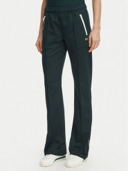 Lacoste Spodnie dresowe XF5253 Zielony ciemny Regular Fit. Zielone spodnie dresowe Lacoste, bez wzorów, z dresówki. Za 724.99 zł.