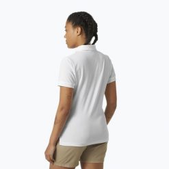 Koszulka polo damska Helly Hansen Siren Polo. Białe koszulki polo Helly Hansen, bez wzorów, bez kołnierzyka, bez ramiączek. Za 260.50 zł.
