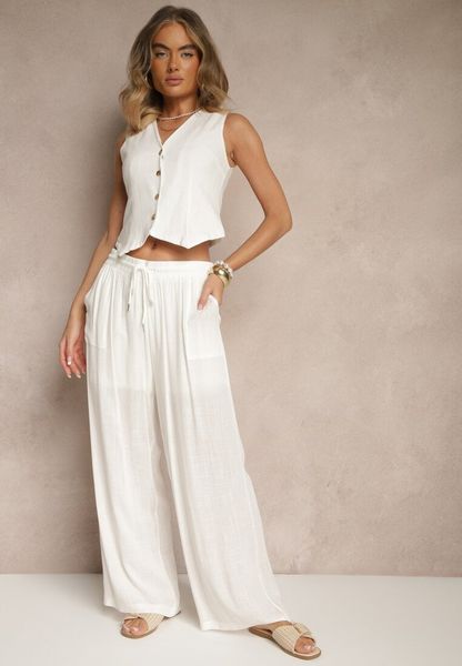 Białe Szerokie Spodnie z Bawełną na Gumce z Kieszeniami Efridessa. Białe spodnie materiałowe Renee, na co dzień, l, bez wzorów, z bawełny, z podwyższonym stanem. Za 44.99 zł.