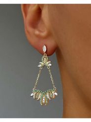 Les Petites Précieuses Pozłacane kolczyki-wkrętki z cyrkoniami rozmiar: onesize. Zielone kolczyki Les Petites Précieuses, z cyrkonią, pozłacane. Za 252.99 zł.