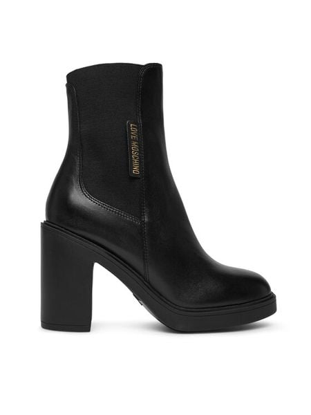 LOVE MOSCHINO Botki JA2413AG0NIA0000 Czarny. Czarne botki Love Moschino, bez wzorów, ze skóry, bez obcasa, na słupku, bez zapięcia. Za 849.99 zł.