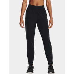 Spodnie sportowe damskie Under Armour UA OutRun the Storm. Czarne spodnie dresowe Under Armour, xl, bez wzorów, z dresówki. Za 399.00 zł.