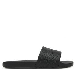 Klapki Calvin Klein. Czarne klapki Calvin Klein, bez wzorów, bez obcasa. Za 169.99 zł.