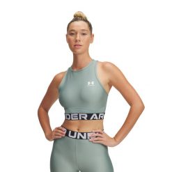 Top treningowy damski Under Armour Heat Gear Rib Tank. Zielone topy Under Armour, m, bez wzorów, bez kołnierzyka, bez ramiączek. Za 79.99 zł.