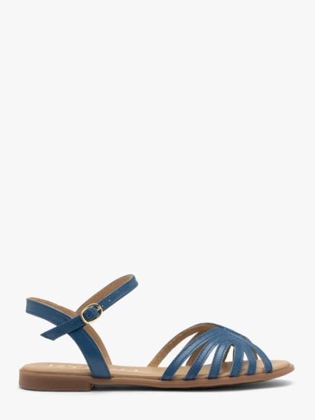 Niebieskie sandały damskie płaskie. Niebieskie sandały Ryłko, bez wzorów, ze skóry, bez obcasa, na płaskiej podeszwie, bez zapięcia. Za 329.99 zł.