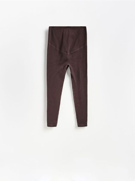 Gładkie legginsy - ciemnobrązowy. Brązowe legginsy Reserved, l, bez wzorów, z dzianiny. Za 89.99 zł.