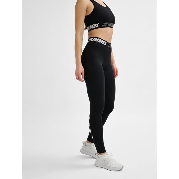 Damskie bawełniane legginsy o średnim kroju Hummel TE Maja. Czarne legginsy Hummel, l, bez wzorów, z bawełny. Za 124.50 zł.