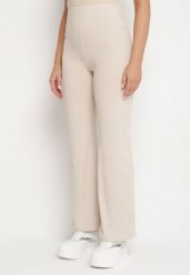 Beżowe Legginsy Dzwony z Wysokim Stanem i Szeroką Gumką w Talii Idoreia. Brązowe legginsy Born2be, m, bez wzorów, z jeansu, z podwyższonym stanem. Za 49.99 zł.
