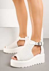 Białe Sandały na Koturnie ze Skórzaną Wkładką i Wycięciami Sopiaella. Białe sandały Born2be, bez wzorów, klasyczne, bez obcasa, na koturnie, bez zapięcia. Za 149.99 zł.