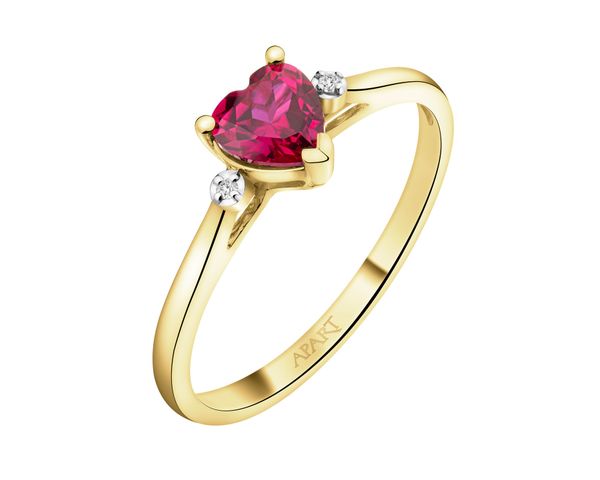 Pierścionek z żółtego złota z diamentami i rubinem syntetycznym - serce - próba 375. Żółte pierścionki Apart, z diamentem, złote. Za 1,290.00 zł.
