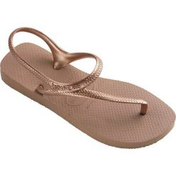 Havaianas - Sandały. Czerwone sandały Havaianas, bez wzorów, z materiału, bez obcasa, bez zapięcia. W wyprzedaży za 79.90 zł.