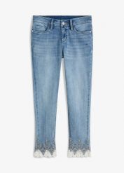 Jeansy skinny z koronką, cropped. Niebieskie jeansy bonprix, z aplikacjami. Za 179.99 zł.