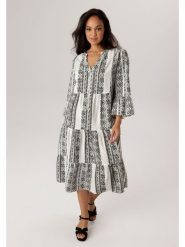 Aniston Sukienka w kolorze czarno-białym rozmiar: 50. Białe sukienki Aniston, bez wzorów, bez kołnierzyka, bez ramiączek, midi. Za 252.99 zł.