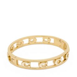 Bransoletka Coach. Żółte bransoletki Coach, złote. Za 559.99 zł.